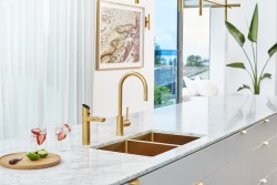 Gold Zenith tap installed in kitchen